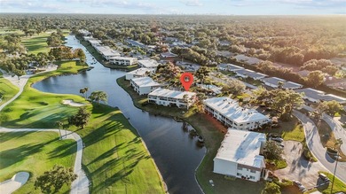 Looking for a 2-bed condo in Palm Aire with golf views? This on Palm Aire Country Club of Sarasota in Florida - for sale on GolfHomes.com, golf home, golf lot
