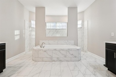 Perfectly positioned on a premium conservation homesite with on ChampionsGate Golf Resort in Florida - for sale on GolfHomes.com, golf home, golf lot