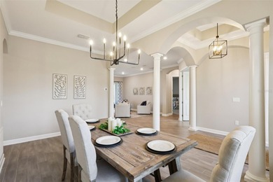 Perfectly positioned on a premium conservation homesite with on ChampionsGate Golf Resort in Florida - for sale on GolfHomes.com, golf home, golf lot