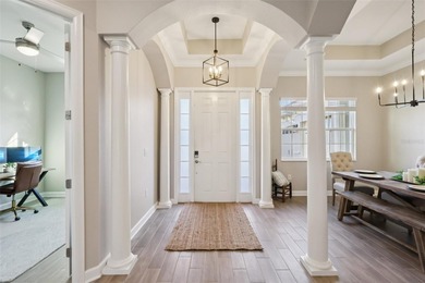 Perfectly positioned on a premium conservation homesite with on ChampionsGate Golf Resort in Florida - for sale on GolfHomes.com, golf home, golf lot