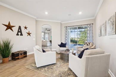 Perfectly positioned on a premium conservation homesite with on ChampionsGate Golf Resort in Florida - for sale on GolfHomes.com, golf home, golf lot