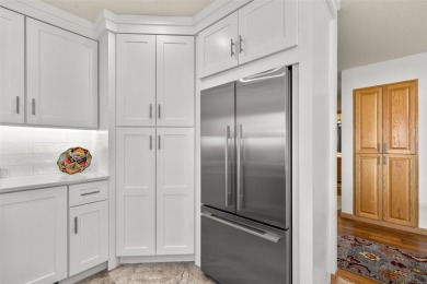 Discover this beautifully updated 3 bedroom, 3 bath end-unit on Eagle Bend Golf Course in Montana - for sale on GolfHomes.com, golf home, golf lot