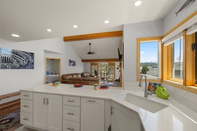 Discover this beautifully updated 3 bedroom, 3 bath end-unit on Eagle Bend Golf Course in Montana - for sale on GolfHomes.com, golf home, golf lot