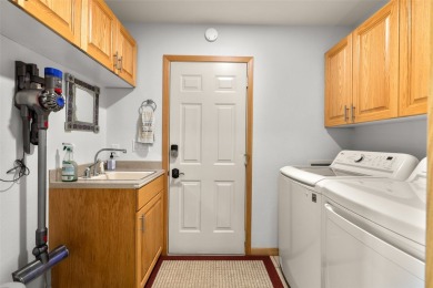 Discover this beautifully updated 3 bedroom, 3 bath end-unit on Eagle Bend Golf Course in Montana - for sale on GolfHomes.com, golf home, golf lot