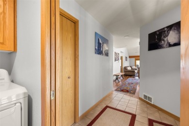 Discover this beautifully updated 3 bedroom, 3 bath end-unit on Eagle Bend Golf Course in Montana - for sale on GolfHomes.com, golf home, golf lot
