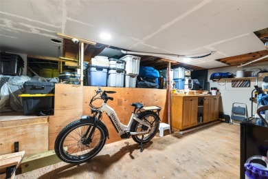 Discover this beautifully updated 3 bedroom, 3 bath end-unit on Eagle Bend Golf Course in Montana - for sale on GolfHomes.com, golf home, golf lot