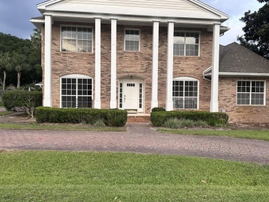 Great curb appeal in desirable Indian Bayou, priced for on Indian Bayou Golf and Country Club in Florida - for sale on GolfHomes.com, golf home, golf lot