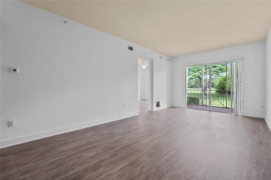 Step into style with this charming 2-bedroom, 2-bathroom unit on Palm-Aire Country Club and Resort - The Oaks in Florida - for sale on GolfHomes.com, golf home, golf lot