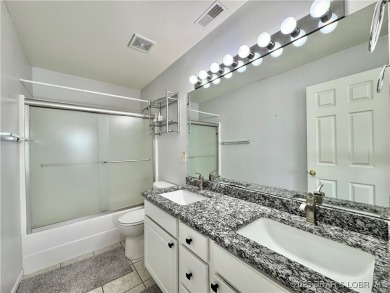 Cedar Glen has a way of helping you forget the daily buzz of on Lake Valley Country Club in Missouri - for sale on GolfHomes.com, golf home, golf lot