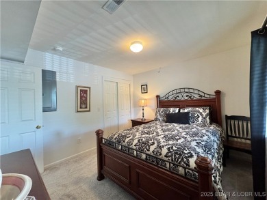 Cedar Glen has a way of helping you forget the daily buzz of on Lake Valley Country Club in Missouri - for sale on GolfHomes.com, golf home, golf lot