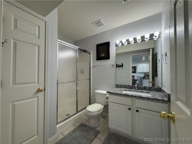 Cedar Glen has a way of helping you forget the daily buzz of on Lake Valley Country Club in Missouri - for sale on GolfHomes.com, golf home, golf lot