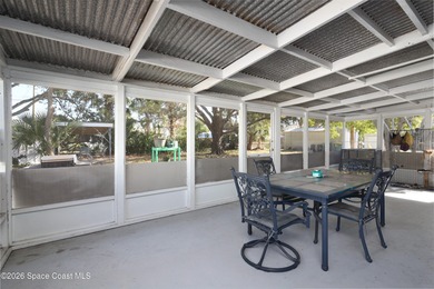 Location, location! This well-situated Central Melbourne home is on Crane Creek Reserve Golf Club in Florida - for sale on GolfHomes.com, golf home, golf lot