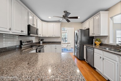 This charming 4-bedroom, 3-bath home offers a perfect blend of on Members Club At St. James Plantation in North Carolina - for sale on GolfHomes.com, golf home, golf lot