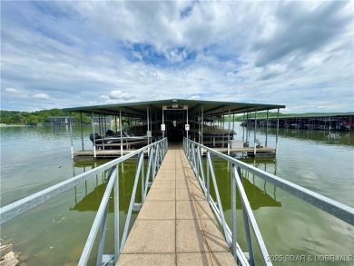 Cedar Glen has a way of helping you forget the daily buzz of on Lake Valley Country Club in Missouri - for sale on GolfHomes.com, golf home, golf lot