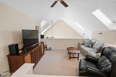 This charming 4-bedroom, 3-bath home offers a perfect blend of on Members Club At St. James Plantation in North Carolina - for sale on GolfHomes.com, golf home, golf lot