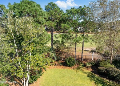 This charming 4-bedroom, 3-bath home offers a perfect blend of on Members Club At St. James Plantation in North Carolina - for sale on GolfHomes.com, golf home, golf lot