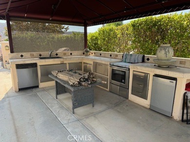 Gorgeous water and golf course views highlight this exceptional on  in California - for sale on GolfHomes.com, golf home, golf lot