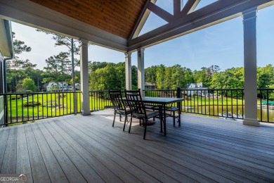 Experience unparalleled luxury and serene lake living in this on Reynolds Lake Oconee - The Oconee in Georgia - for sale on GolfHomes.com, golf home, golf lot