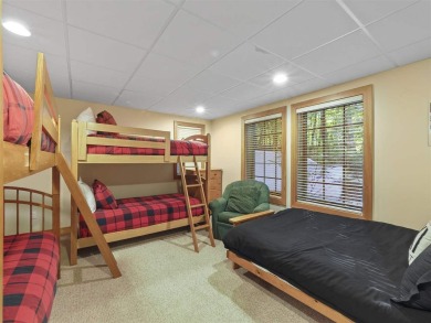 Welcome to your mountain retreat in the heart of Boyne Mountain on Boyne Mountain Resort - Alpine in Michigan - for sale on GolfHomes.com, golf home, golf lot