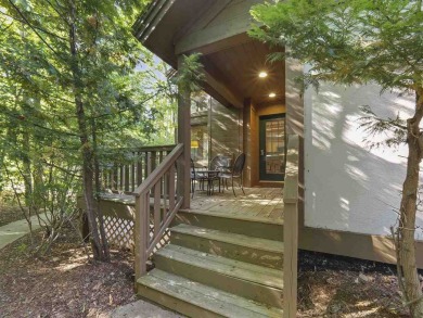 Welcome to your mountain retreat in the heart of Boyne Mountain on Boyne Mountain Resort - Alpine in Michigan - for sale on GolfHomes.com, golf home, golf lot