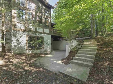 Welcome to your mountain retreat in the heart of Boyne Mountain on Boyne Mountain Resort - Alpine in Michigan - for sale on GolfHomes.com, golf home, golf lot