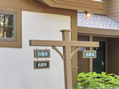Welcome to your mountain retreat in the heart of Boyne Mountain on Boyne Mountain Resort - Alpine in Michigan - for sale on GolfHomes.com, golf home, golf lot