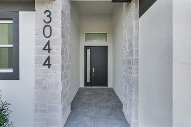 Beautiful 3 bedroom courtyard home with pool and spa located on Providence Golf Club in Florida - for sale on GolfHomes.com, golf home, golf lot