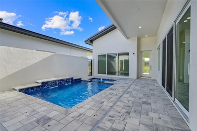 Beautiful 3 bedroom courtyard home with pool and spa located on Providence Golf Club in Florida - for sale on GolfHomes.com, golf home, golf lot
