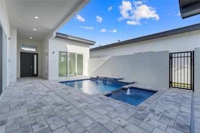 Beautiful 3 bedroom courtyard home with pool and spa located on Providence Golf Club in Florida - for sale on GolfHomes.com, golf home, golf lot