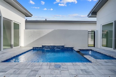 Beautiful 3 bedroom courtyard home with pool and spa located on Providence Golf Club in Florida - for sale on GolfHomes.com, golf home, golf lot