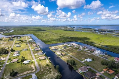 DIRECT GULF ACCESS waterfront property literally feet off the NW on Burnt Store Golf Club in Florida - for sale on GolfHomes.com, golf home, golf lot