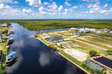 DIRECT GULF ACCESS waterfront property literally feet off the NW on Burnt Store Golf Club in Florida - for sale on GolfHomes.com, golf home, golf lot