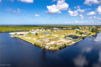 DIRECT GULF ACCESS waterfront property literally feet off the NW on Burnt Store Golf Club in Florida - for sale on GolfHomes.com, golf home, golf lot