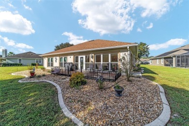 Welcome to the beautiful home located in The Lakes of Lady Lake on Lakes of Lady Lake Golf Course in Florida - for sale on GolfHomes.com, golf home, golf lot