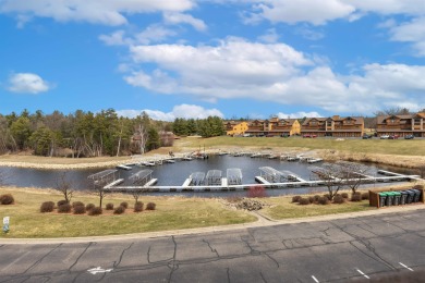 One-of-a-kind Northern Bay condo overlooking Tee Box #2! This on Northern Bay Golf Resort and Marina in Wisconsin - for sale on GolfHomes.com, golf home, golf lot