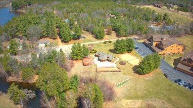 One-of-a-kind Northern Bay condo overlooking Tee Box #2! This on Northern Bay Golf Resort and Marina in Wisconsin - for sale on GolfHomes.com, golf home, golf lot