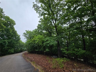 Gentle sloping lot nestled in a quiet cul-de-sac on Via Bello on The Club At Porto Cima in Missouri - for sale on GolfHomes.com, golf home, golf lot