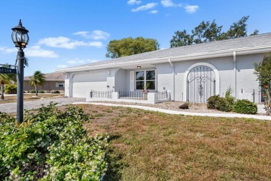 Nestled on a serene cul-de-sac with picturesque lake views, this on Caloosa Greens Executive Golf Course in Florida - for sale on GolfHomes.com, golf home, golf lot