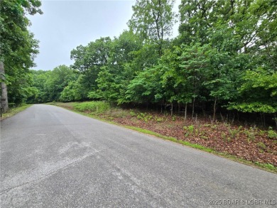 Gentle sloping lot nestled in a quiet cul-de-sac on Via Bello on The Club At Porto Cima in Missouri - for sale on GolfHomes.com, golf home, golf lot