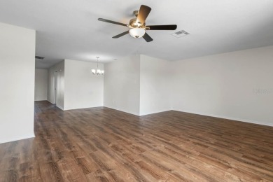 Nestled on a serene cul-de-sac with picturesque lake views, this on Caloosa Greens Executive Golf Course in Florida - for sale on GolfHomes.com, golf home, golf lot