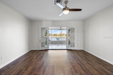 Nestled on a serene cul-de-sac with picturesque lake views, this on Caloosa Greens Executive Golf Course in Florida - for sale on GolfHomes.com, golf home, golf lot