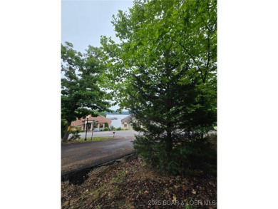 Build your dream home on this .635-acre corner lot in the on The Club At Porto Cima in Missouri - for sale on GolfHomes.com, golf home, golf lot