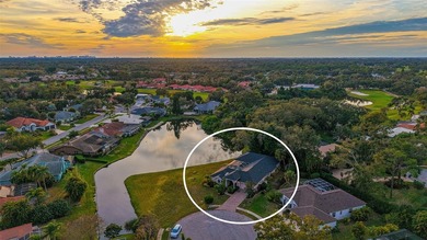 Gorgeous and unique courtyard pool home offering spectacular on University Park Country Club in Florida - for sale on GolfHomes.com, golf home, golf lot