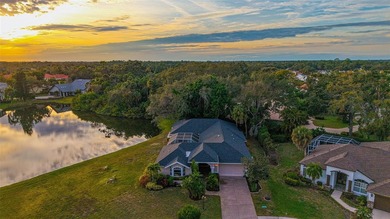 Gorgeous and unique courtyard pool home offering spectacular on University Park Country Club in Florida - for sale on GolfHomes.com, golf home, golf lot