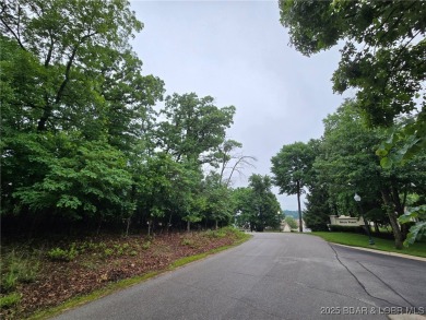 Build your dream home on this .635-acre corner lot in the on The Club At Porto Cima in Missouri - for sale on GolfHomes.com, golf home, golf lot