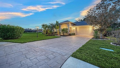 Gorgeous and unique courtyard pool home offering spectacular on University Park Country Club in Florida - for sale on GolfHomes.com, golf home, golf lot