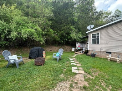 Quiet and peaceful 3 bed, 2 bath home overlooking Edgewood on Edgewood Country Club in West Virginia - for sale on GolfHomes.com, golf home, golf lot