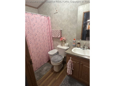 Quiet and peaceful 3 bed, 2 bath home overlooking Edgewood on Edgewood Country Club in West Virginia - for sale on GolfHomes.com, golf home, golf lot