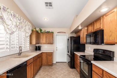 Step into this lovely 2-bedroom, 2-bath home nestled in the on Coyote Lakes Golf Club in Arizona - for sale on GolfHomes.com, golf home, golf lot