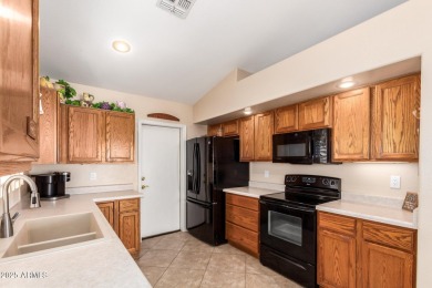 Step into this lovely 2-bedroom, 2-bath home nestled in the on Coyote Lakes Golf Club in Arizona - for sale on GolfHomes.com, golf home, golf lot